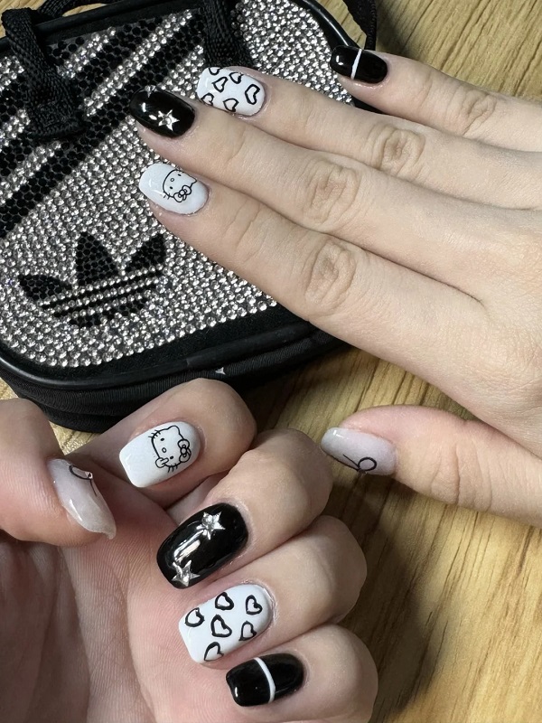Nail trắng đen kết hợp nhũ ánh kim nhẹ nhàng
