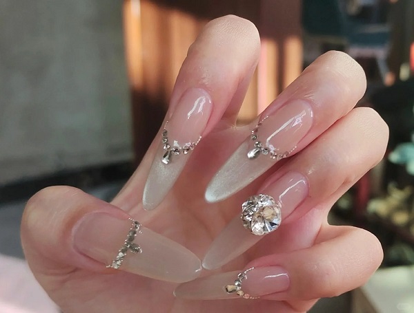 Thiết kế nail tráng gương mắt mèo tone đỏ quyến rũ