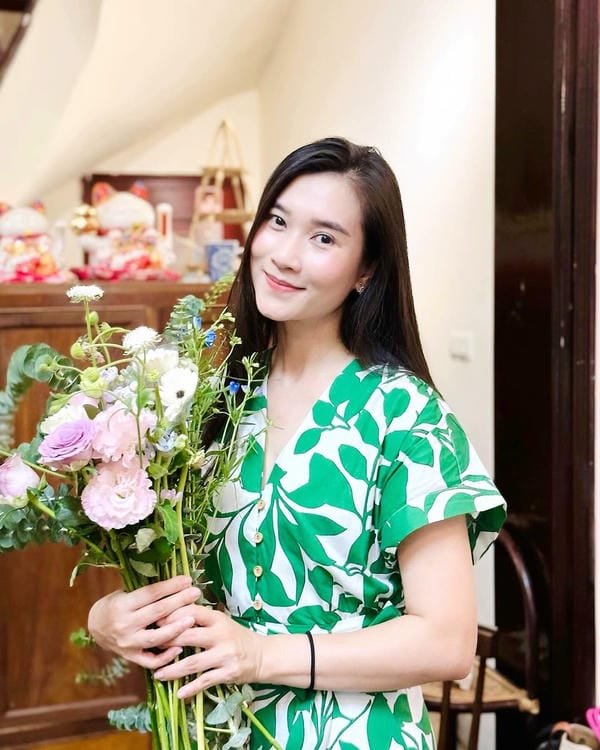 chồng biên tập viên khánh trang la ai 20